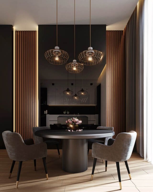 gray dining table under pendant lamps.jpg